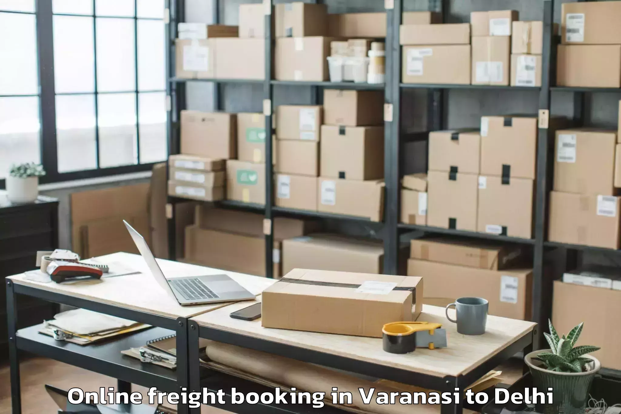 Book Varanasi to Unity One Janakpuri Mall Online Freight Booking